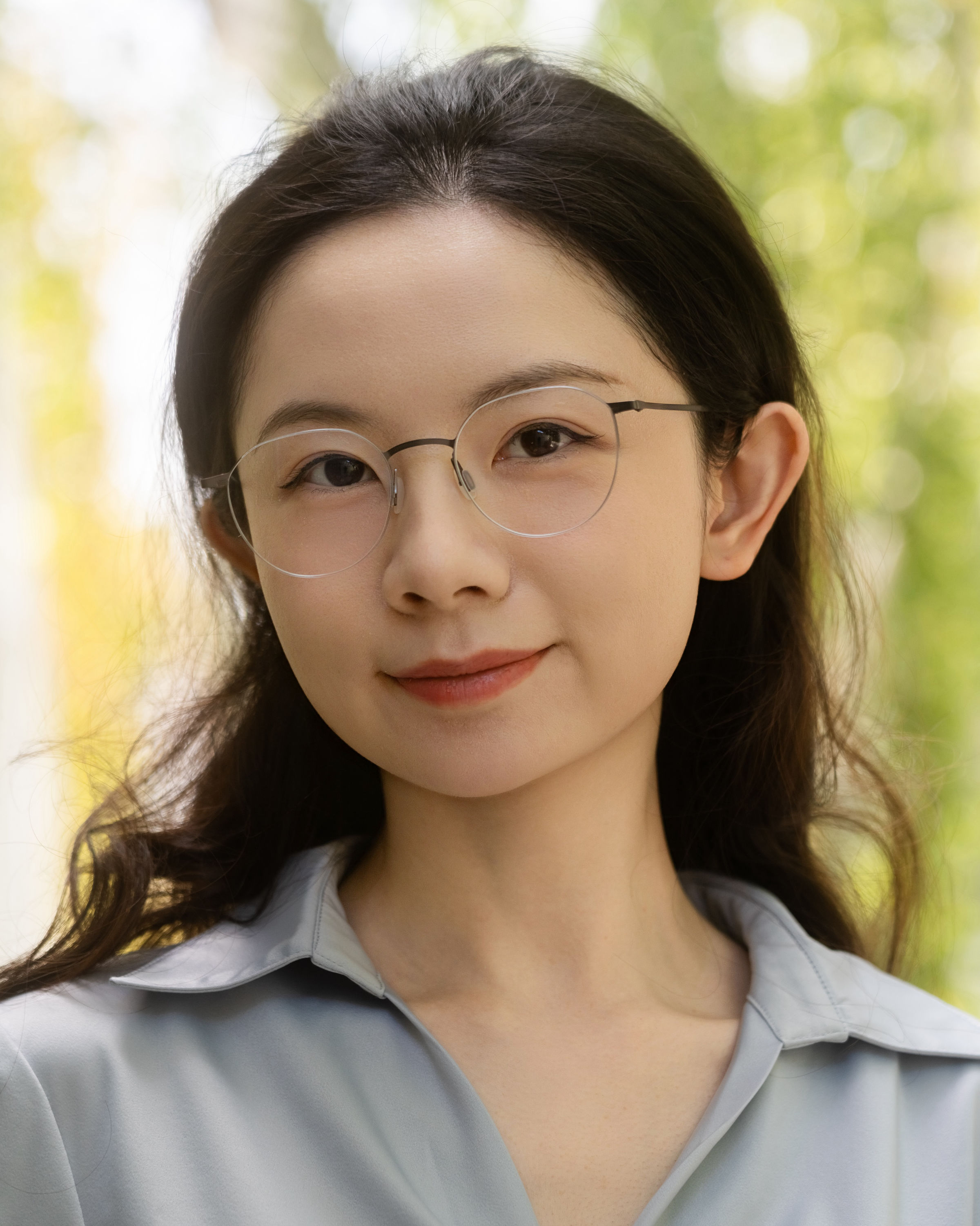 Leighton Zhang headshot in a studio portrait