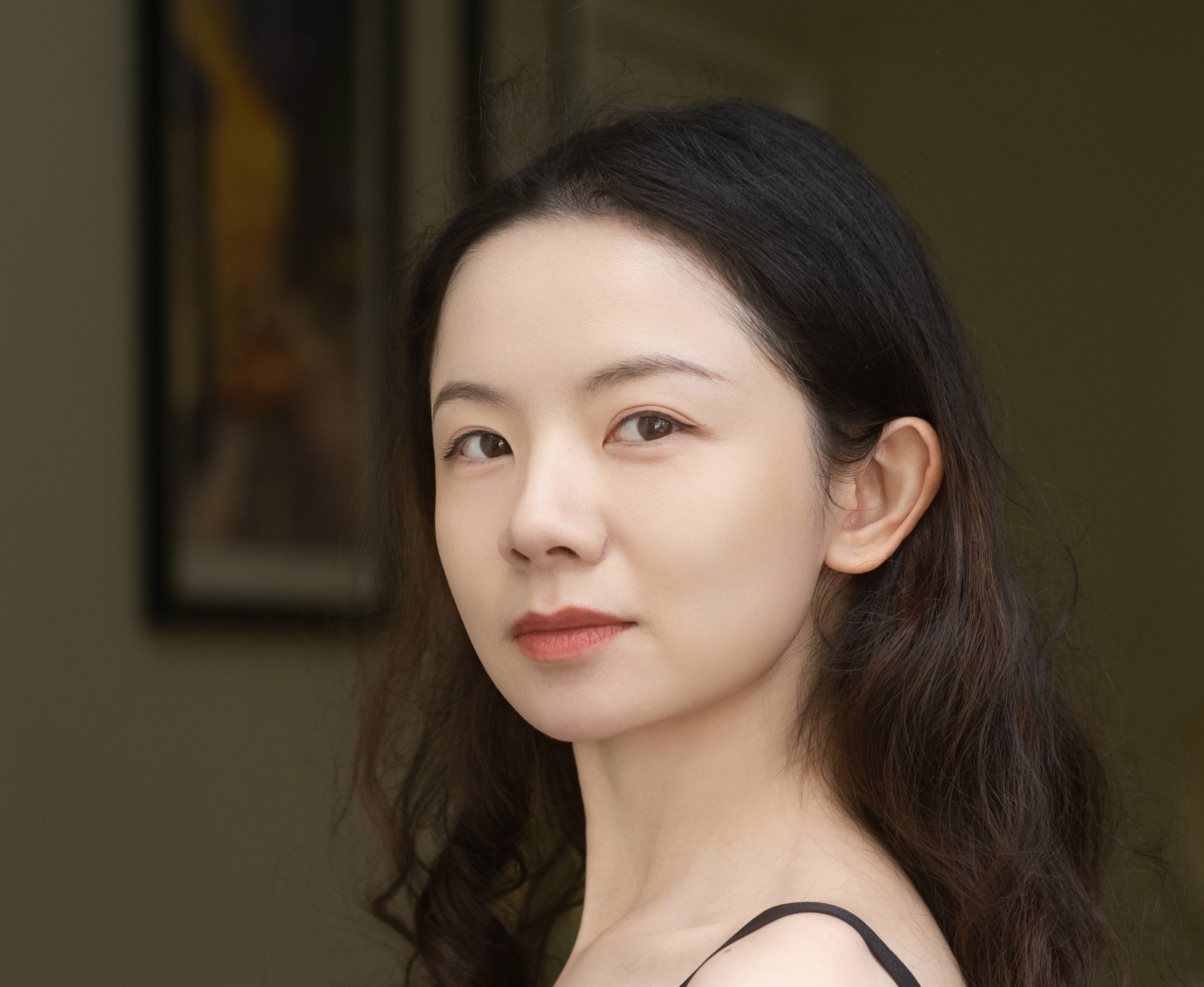 Leighton Zhang in a portrait headshot